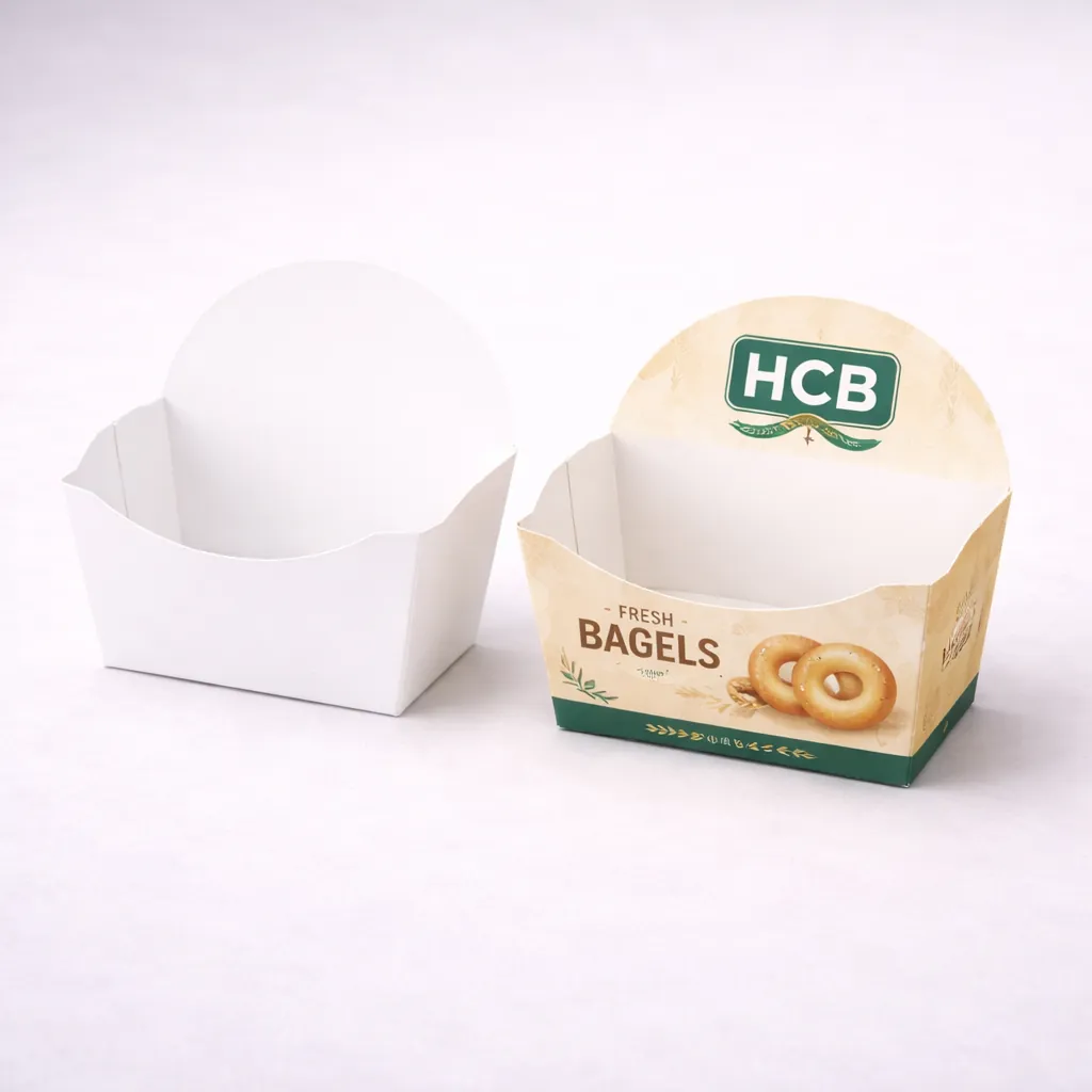 Cardboard bagel boxes with a front cutout window, showing a plain white and a custom-branded version. class=